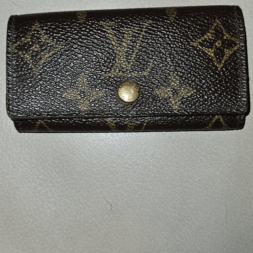 Louis Vuitton key chain .